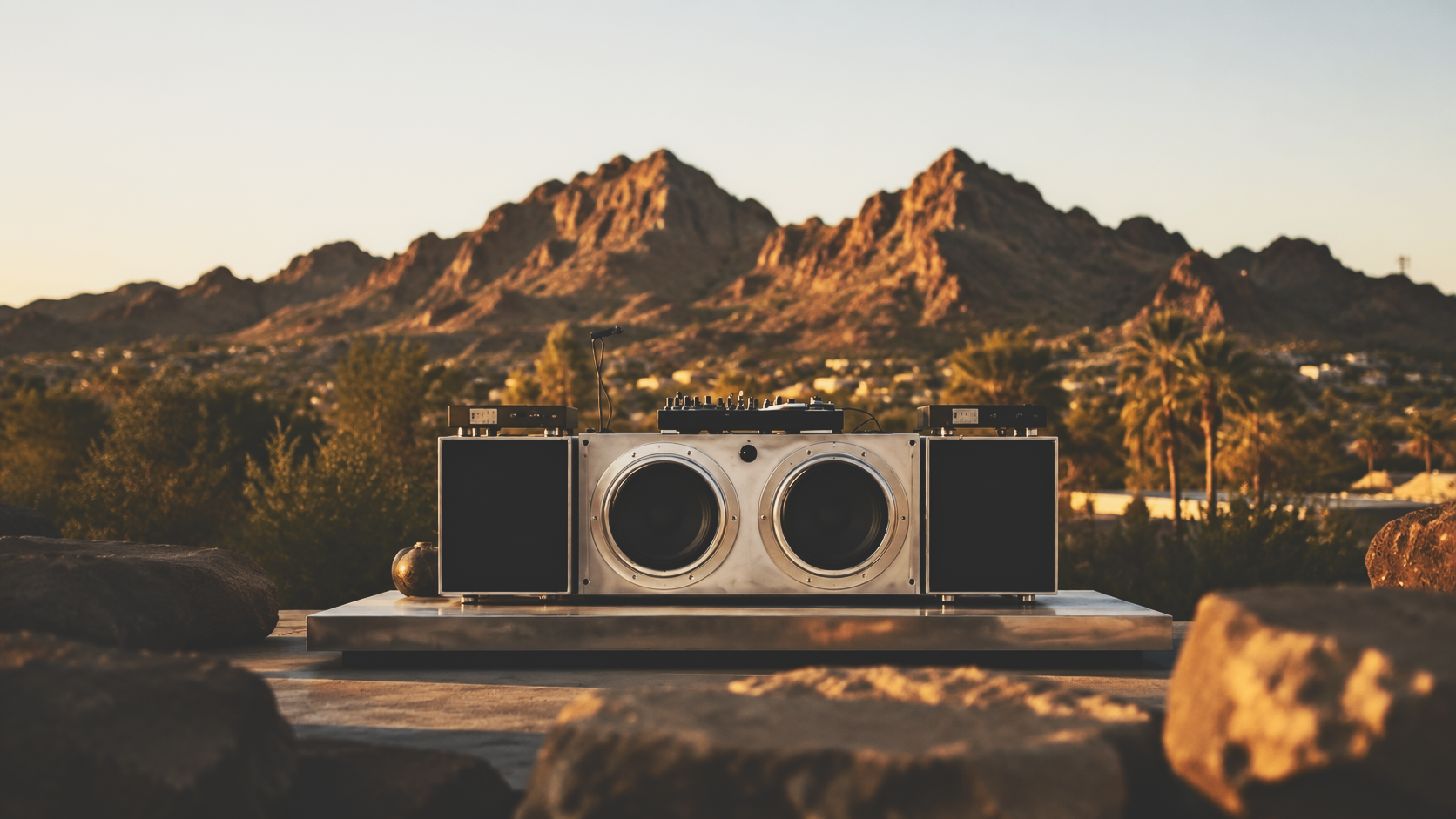 Custom YARDSIIX soundsystem installed in the Arizona desert at sunset with Camelback mountains in the background.